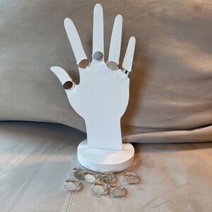 Twelve adjustable silver rings